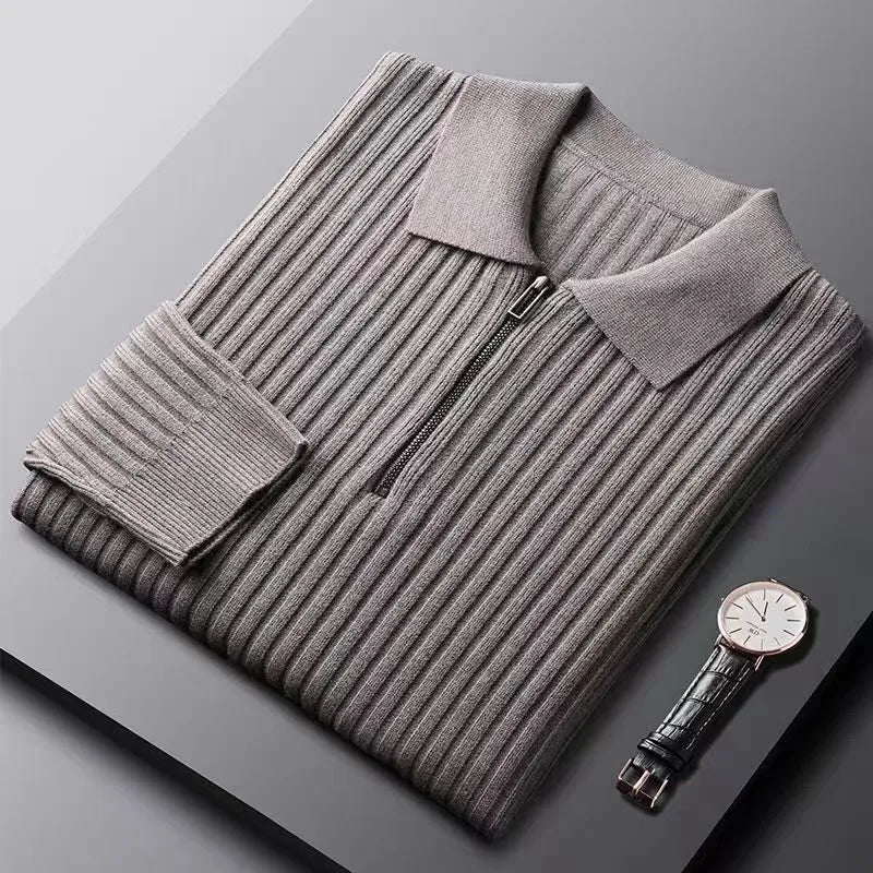 Elegante jersey con cremallera y diseño a rayas